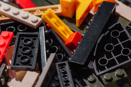 KYIV, UKRAINE - MARCH 15, 2019: close up view of colorful scattered plastic lego blocks