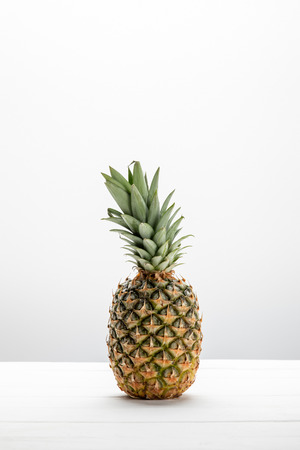 sweet fresh tasty and raw pineapple on whiteの写真素材