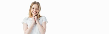 happy and excited teenage girl looking at camera isolated on white, panoramic shot