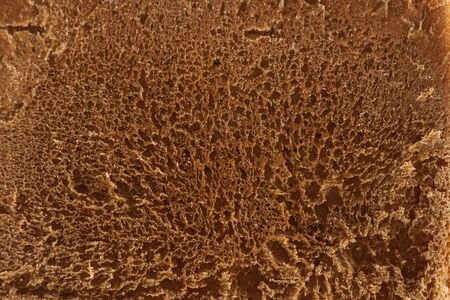 close up view of brown fresh baked textured bread