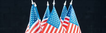 panoramic shot of national american flags isolated on black, Independence Day concept