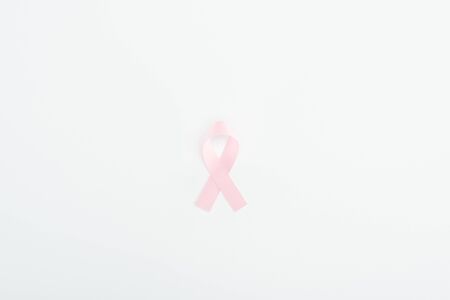 top view of pink breast cancer sign on white backgroundの写真素材
