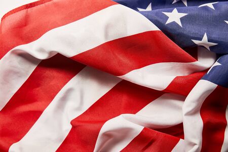 Close up view of crumpled national American flagの写真素材
