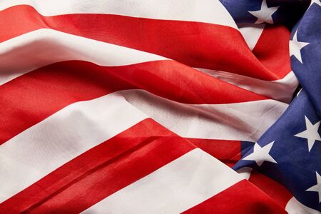 Close up view of crumpled national American flagの写真素材