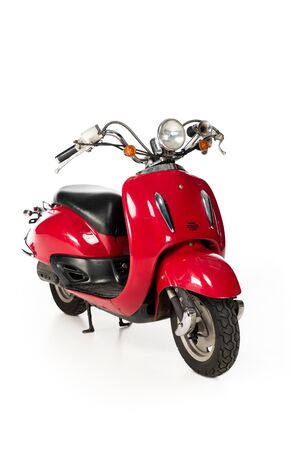 new red scooter isolated on whiteの写真素材