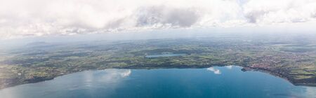 panoramic shot of aerial view of sea under blue sky with clouds in rome, italyの写真素材