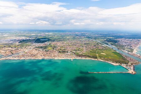 aerial view turquoise sea and green coast, rome, italyの写真素材