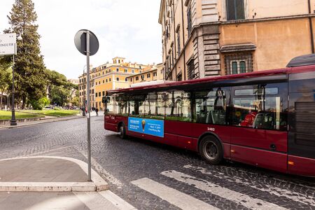 ROME, ITALY - JUNE 28, 2019: crowd of people and transport on streetのeditorial素材