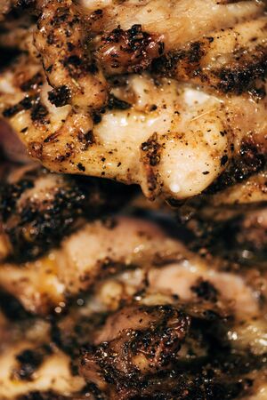 close up view of delicious meat on rotisserie