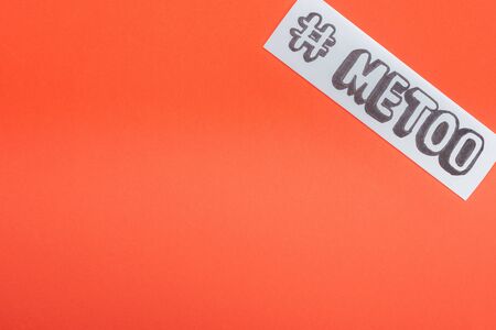 top view of paper with hashtag me too isolated on orange