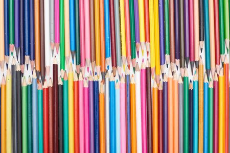 Two lines of different sizes sharpened color pencilsの写真素材