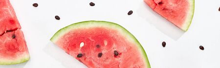 panoramic shot of delicious watermelon slices on white background