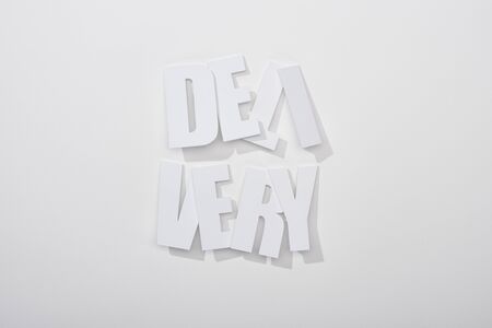 separated crooked delivery inscription with shadow on white background