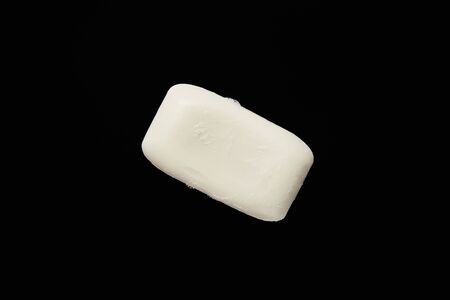 top view of white soap isolated on black with copy spaceの写真素材