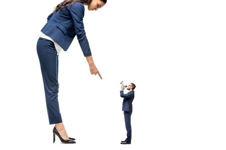 small businessman shouting in mouthpiece at big businesswoman pointing with finger Isolated On Whiteの写真素材