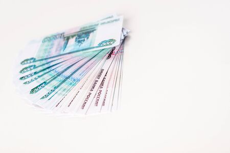 selective focus of russian banknotes isolated on white with copy space