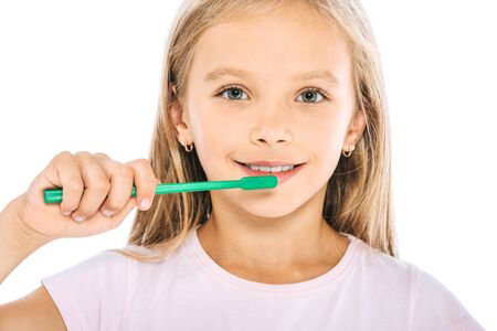 happy kid holding toothbrush isolated on white