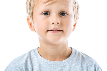 happy and cute boy looking at camera isolated on white