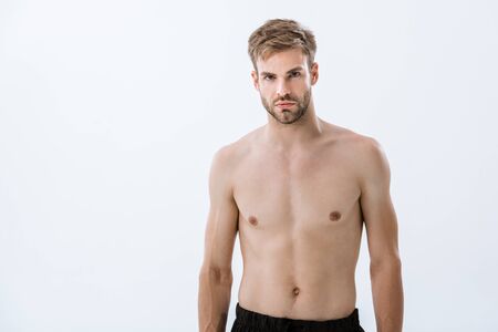 bearded shirtless sportsman looking at camera isolated on greyの写真素材