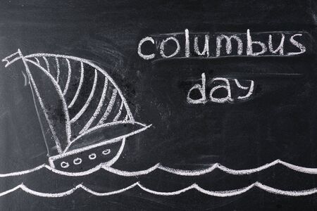 chalkboard with ship drawing and Columbus Day inscriptionの写真素材
