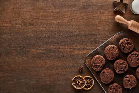 top view of chocolate cookies on wooden table
