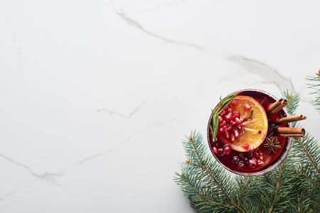 top view of christmas cocktails with orange, pomegranate, cinnamonの写真素材