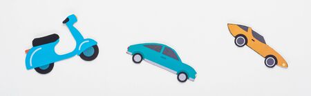 top view of paper cut vehicles on white background, panoramic shotの写真素材