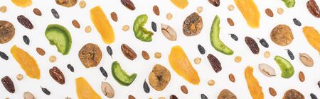 top view of assorted nuts, dried fruits and candied fruit isolated on white, panoramic shotの写真素材