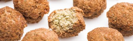 close up view of delicious fresh cooked falafel balls on white background, panoramic shotの写真素材