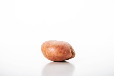 organic raw potato on white backgroundの写真素材