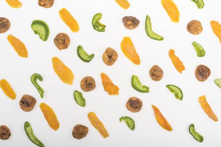 top view of assorted dried fruits and candied fruit isolated on whiteの写真素材