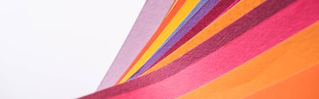 panoramic shot of colorful and bright papers isolated on white