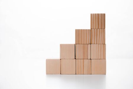 wooden cubes on white with copy space