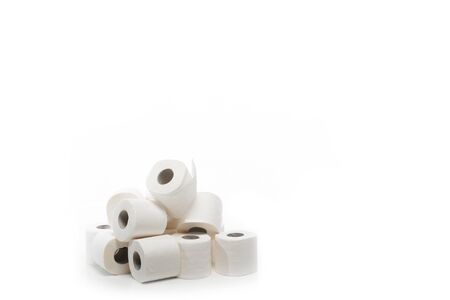 rolls of toilet paper in stack isolated on whiteの写真素材