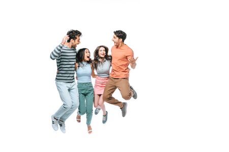 excited friends jumping and celebrating triumph, isolated on white