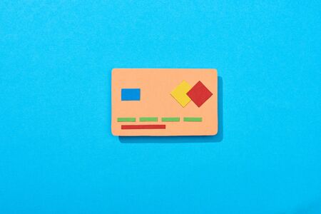 top view of empty credit card on blue on backgroundの写真素材