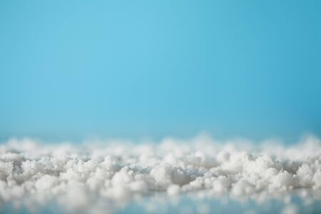 decorative snow on blue for christmas background