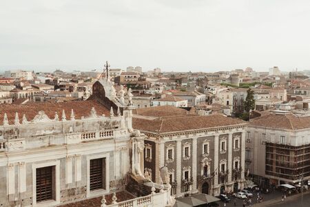 CATANIA, ITALY - OCTOBER 3, 2019: church near small old houses in catania, italyのeditorial素材