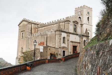SAVOCA, ITALY - OCTOBER 3, 2019: Church of San Nicolo near paving stones on roadのeditorial素材