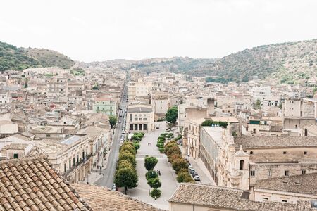 SCICLI, ITALY - OCTOBER 3, 2019: old city with small houses near san michele arcangelo church in sicilyのeditorial素材