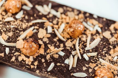 close up of delicious chocolate bar with hazelnutsの写真素材