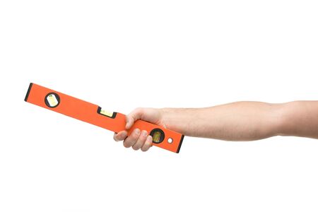 cropped view of man holding spirit level isolated on white
