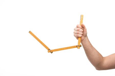 cropped view of man holding measure ruler isolated on whiteの写真素材