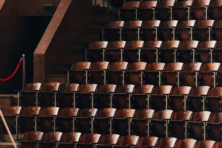Empty wooden seats and entrance in circusの写真素材