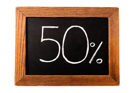 top view of number 50 and percent sign written on chalkboard isolated on white