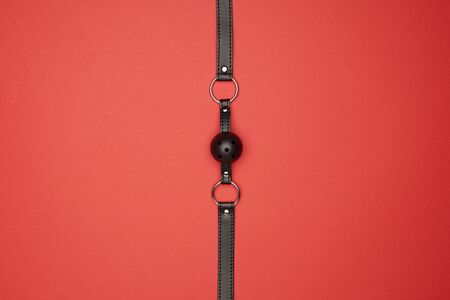 top view of black gag isolated on redの写真素材
