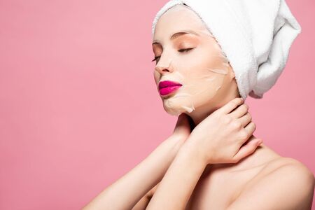 young woman in moisturizing face mask with closed eyes isolated on pink