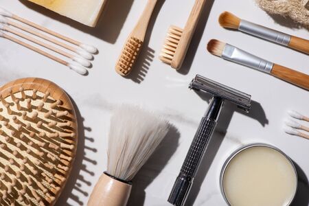 Top view of different kinds of hygiene items on white background, zero waste conceptの写真素材