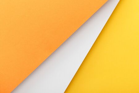 Top view of yellow, orange and white background