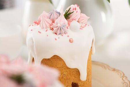 close up view of delicious Easter cake with white glaze and meringueの写真素材